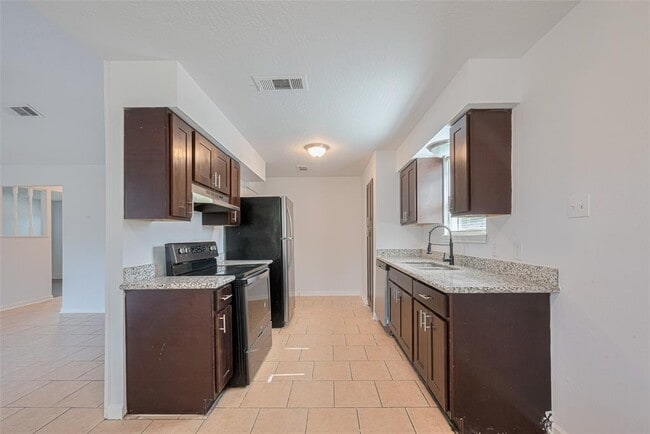 Building Photo - 7926 Jonquil Dr