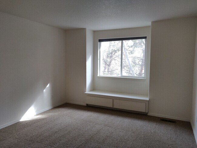 Building Photo - Spacious and charming, this two-story 4 be...