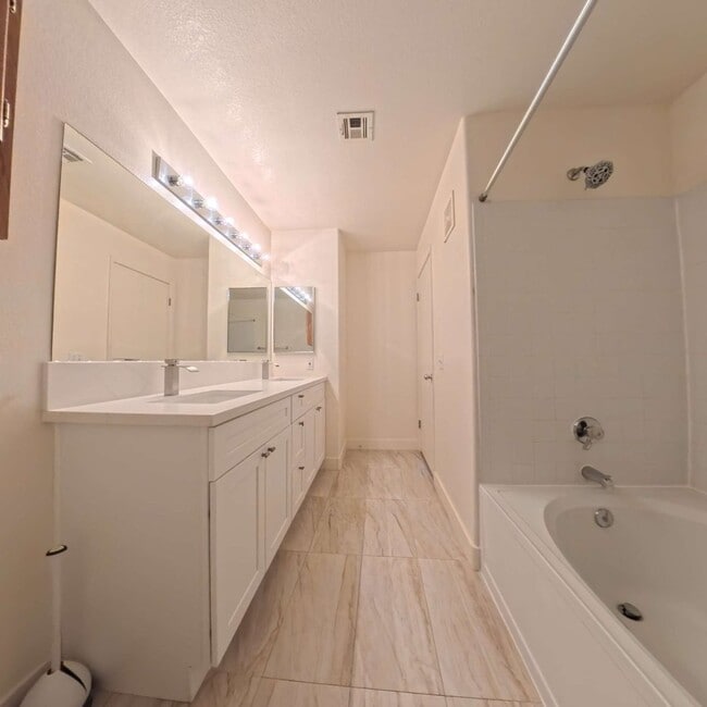Building Photo - Upgraded 1 Bed 1 Bath Second-Story Condo at Opulence!