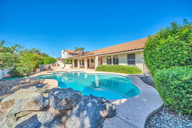 Building Photo - 5639 E Aire Libre Ave