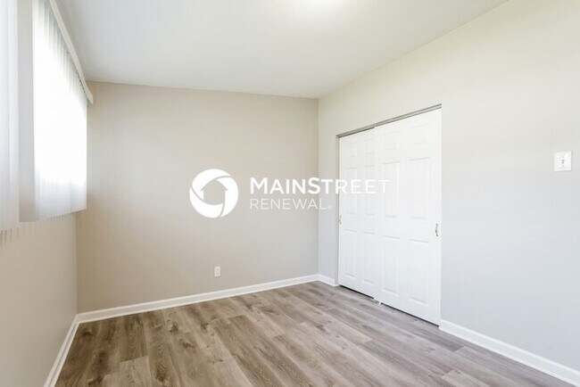 Building Photo - 6910 Woodhurst Dr