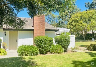 Building Photo - Spacious 2-bedroom, 2-bathroom condo featu...