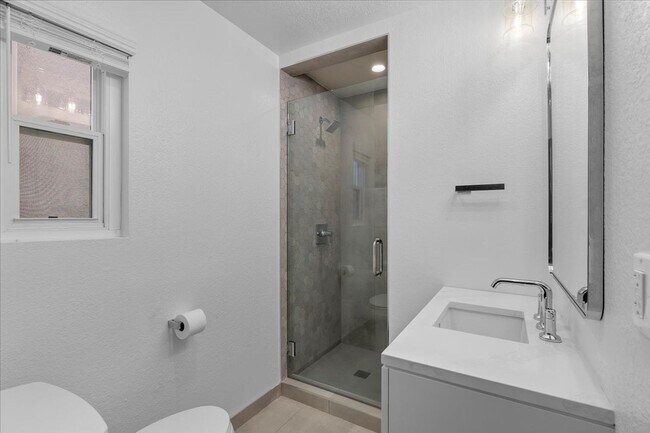 Building Photo - COMPLETELY REMODELED, BRIGHT & AIRY, TRI-LEVEL HOME W/ TOP-FLOOR GREAT ROOM LIVING SPACE, 2-CAR G...