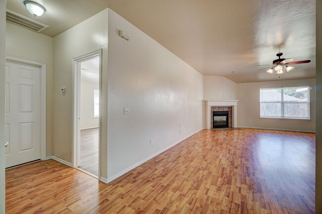 Building Photo - Spacious 4-Bedroom Home with Corner Firepl...