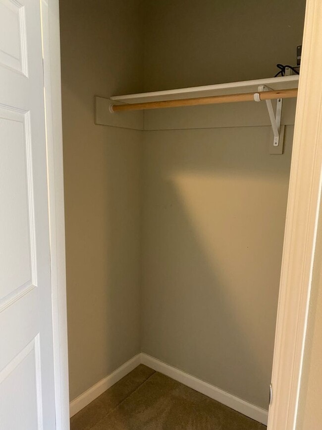 Building Photo - Spacious End Unit Condo