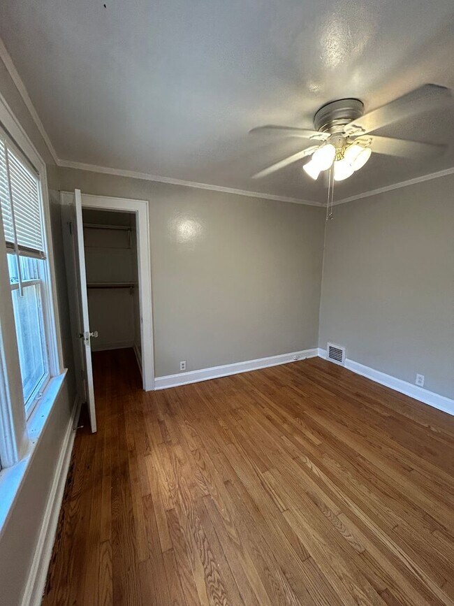 Building Photo - Charming 4-Bed Home with Fireplace & Hardw...