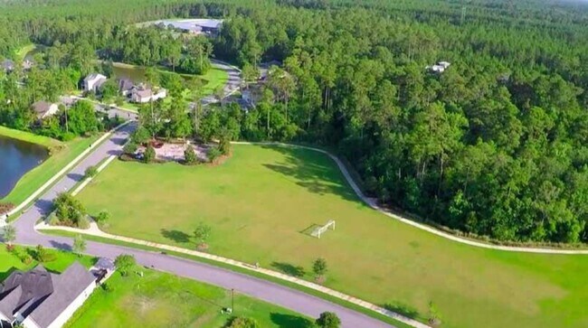 Building Photo - Spacious 5 Bedroom, 3 Bathroom Home with Flex Room, Loft & Pond View