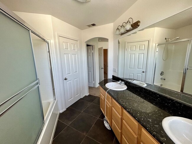 Building Photo - Spacious 3-Bedroom, 2.5-Bath Condo for Ren...