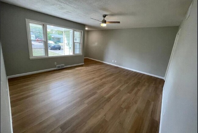 Building Photo - Welcome to Your Next Home with Harvest Investments!