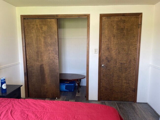 Building Photo - Spacious, four-bedroom, two-bathroom, coun...