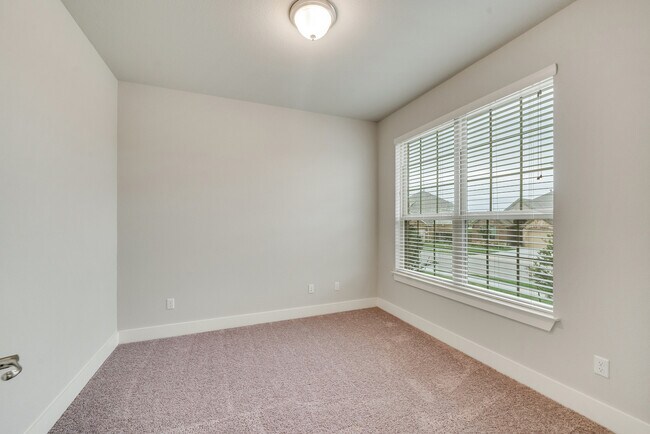 Building Photo - 8325 Paola St