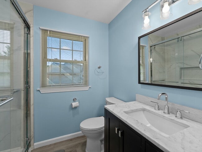 Building Photo - "Stunning 4-Bed Gem with Finished Basement...