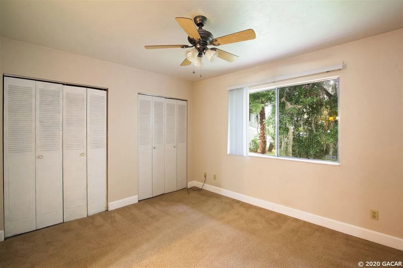 Bedroom #2 w/ view to nature. - 4411 SW 34th St