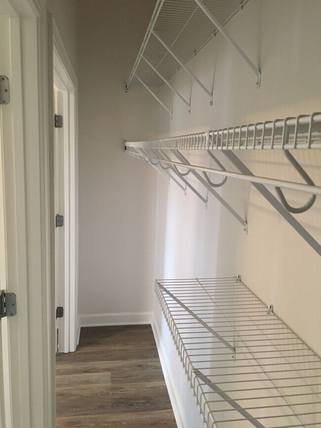 Building Photo - Inviting, modern two bedroom with garage parking, balcony views and a wonderful location in Chape...