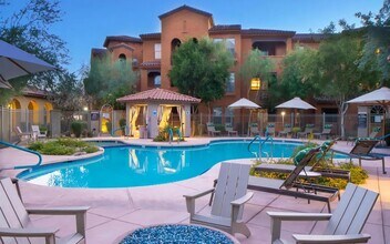 Relaxing Pool Deck with Lounge Chairs and Evening Ambiance - Desert Parks Vista
