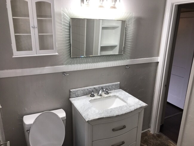 Building Photo - 3 Bedroom/1 bath home on corner lot with a large fenced back yard