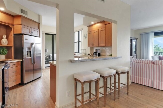 Building Photo - 7008 Pelican Bay Blvd