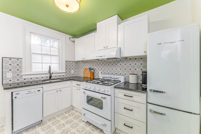 Brand new cabinets, tile floors and backsplash and all appliances - 108 W Henry St