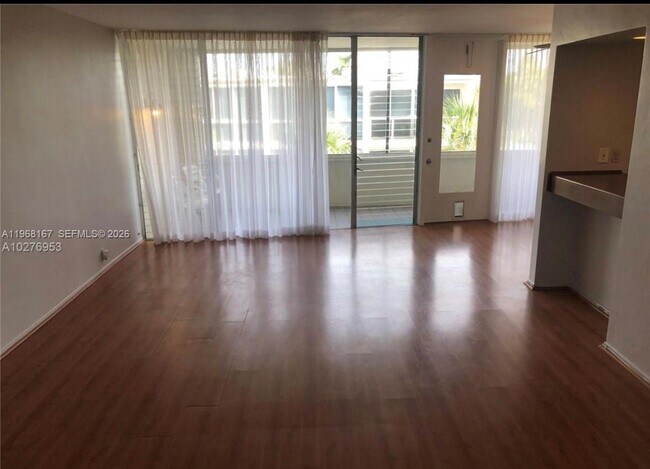 Building Photo - 10210 Collins Ave