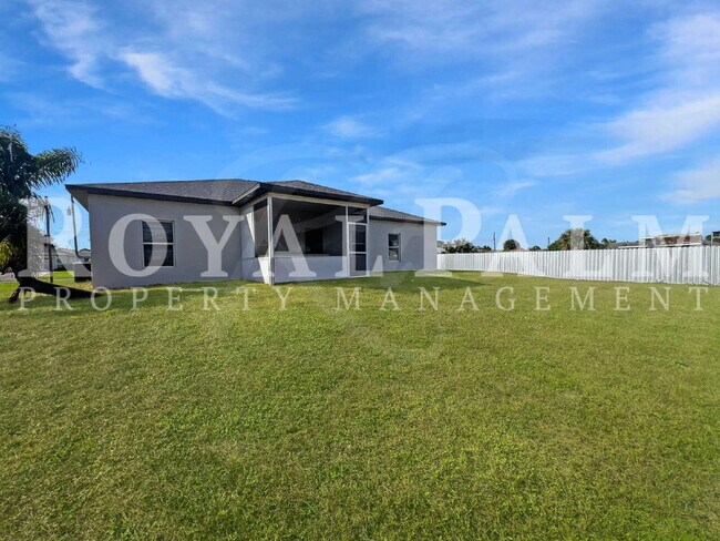 Building Photo - 3BR/2BA Home Ready to Bloom in Lehigh Acres. Garage + Spring Savings Included!