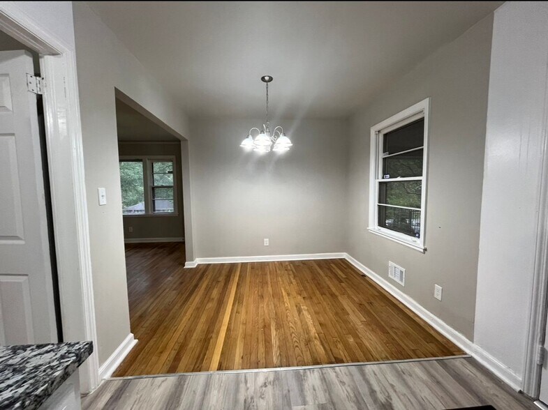 Building Photo - COMING SOON: Classic charm, peaceful living, your Forest Park retreat awaits in this spacious 3-b...