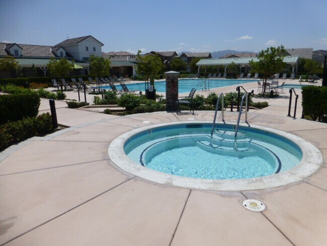 Building Photo - Short Term Lease - Grand 4-Bedroom Home with Entertainer's Yard in Gated River Village!