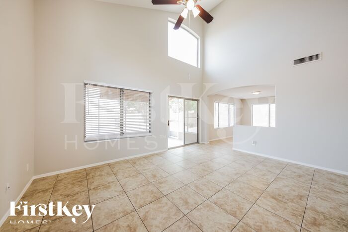 Building Photo - 6968 W Aire Libre Ave