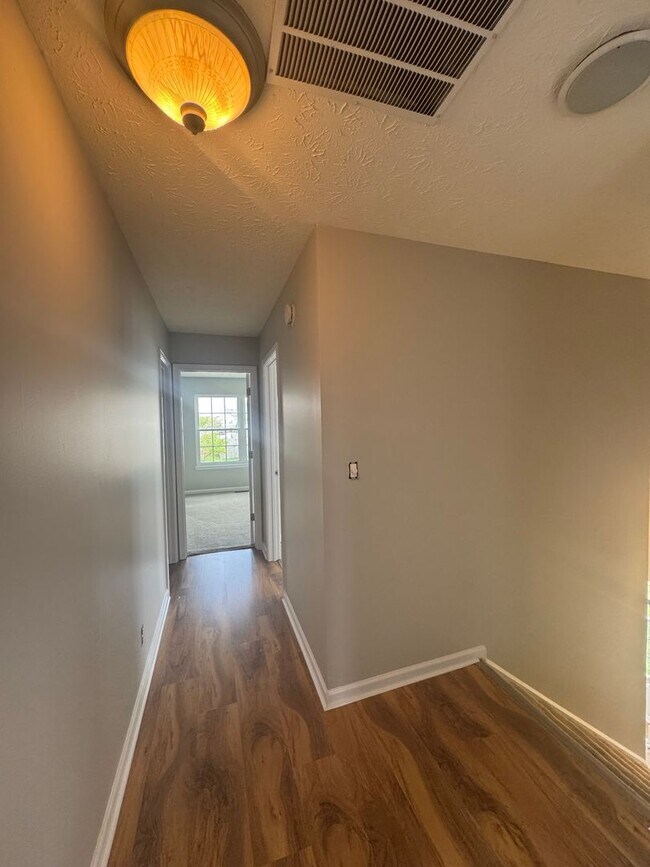 Building Photo - Three Bedroom Home with Fenced in Yard!