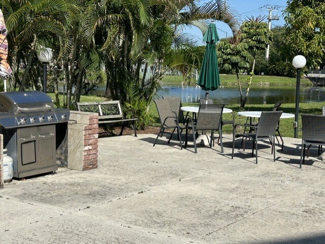 Lake with Barbecue Patio - 3091 NW 46th Ave