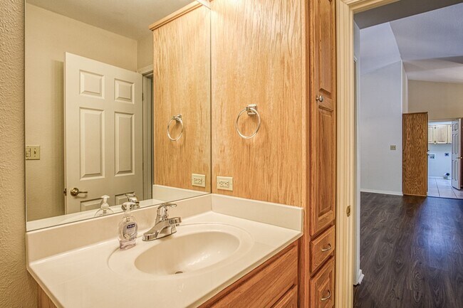 Building Photo - This beautiful home is located in a quiet private neighborhood and perfect for a serene living at...