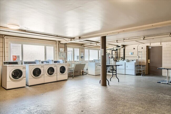 Building Photo - MOVE IN SPECIAL- Live in the Heart of Nort...