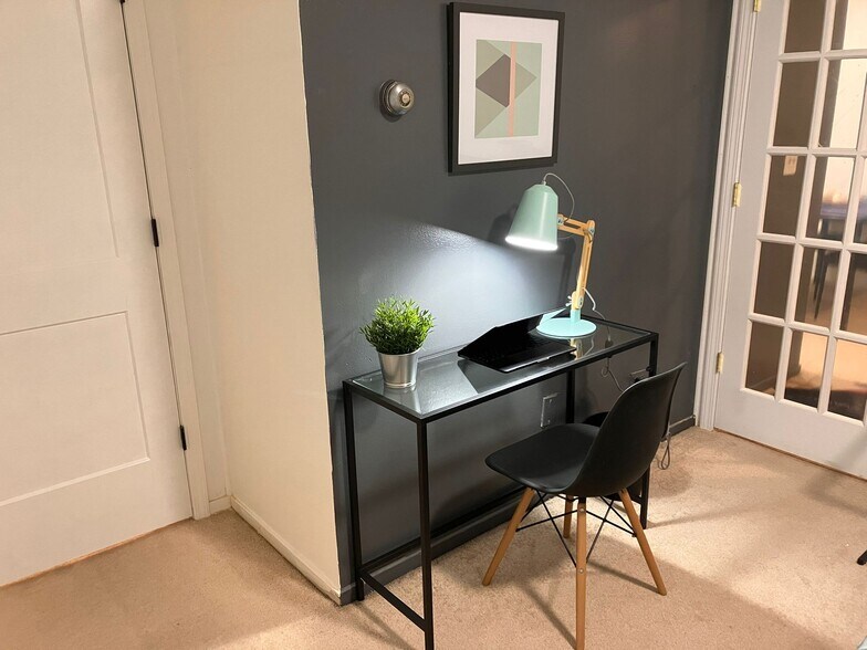 Desk & chair for work - 8200 E Jefferson Ave