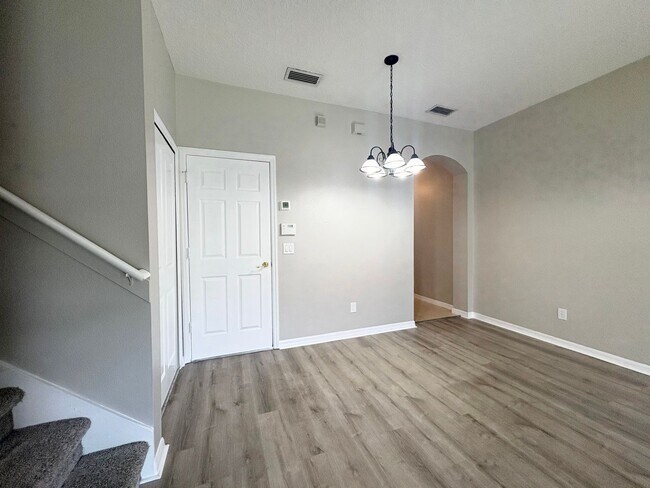 Building Photo - Gated 3B/2.5B Sanford Townhome ~ Fresh paint! ~ New flooring!