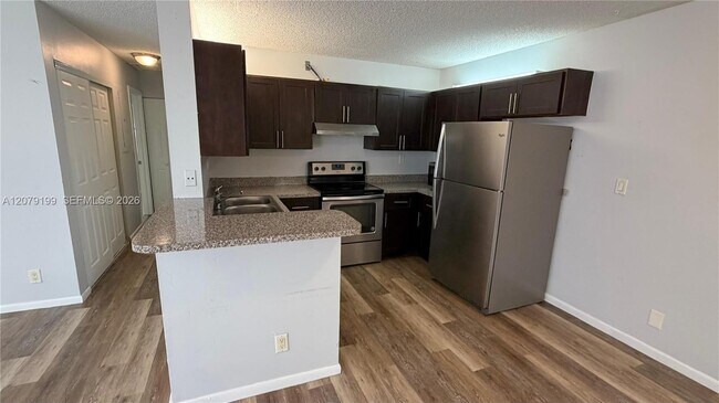 Building Photo - 11641 Royal Palm Blvd