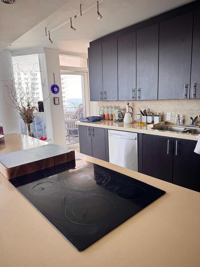 Building Photo - 6301 Collins Ave