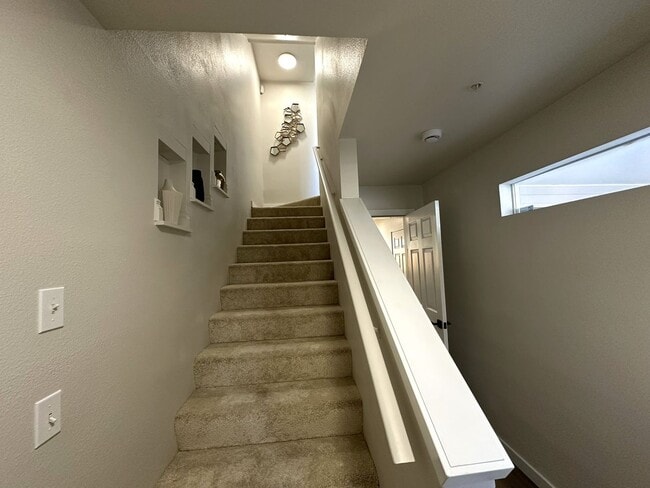 Building Photo - Updated 3-Story Condo with Balconies in So...