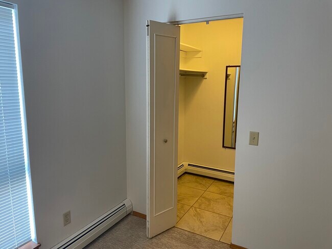 Main bed walk in closet - 4155 W Rivers Edge Cir