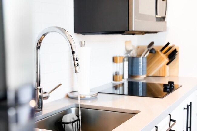 Building Photo - Stylish Furnished Loft Steps from Downtown