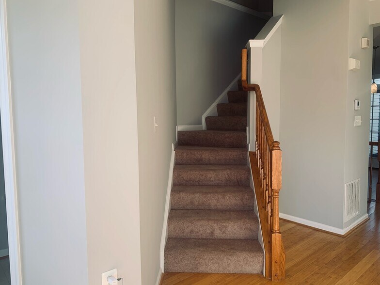 First Floor Staircase - 6520 Landing Way