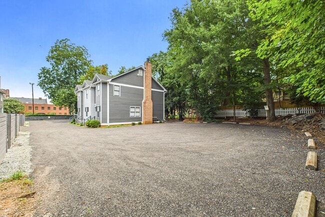 Building Photo - UNCG Area – Chancellors Court Townhomes. Walk to Campus and just minutes to Downtown!