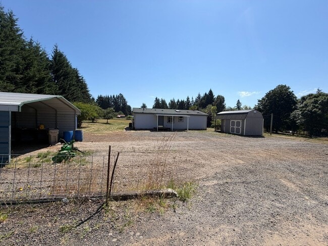 Building Photo - 2.5 Acres with Barn across from Lacomb School!