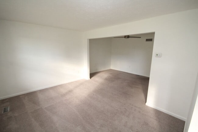 Building Photo - *Coming Soon*  Upgraded End Unit Townhome ...