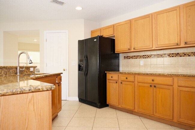 Building Photo - Beautiful 4 bedroom 2.5 bath at Remington gated community in Kissimmee