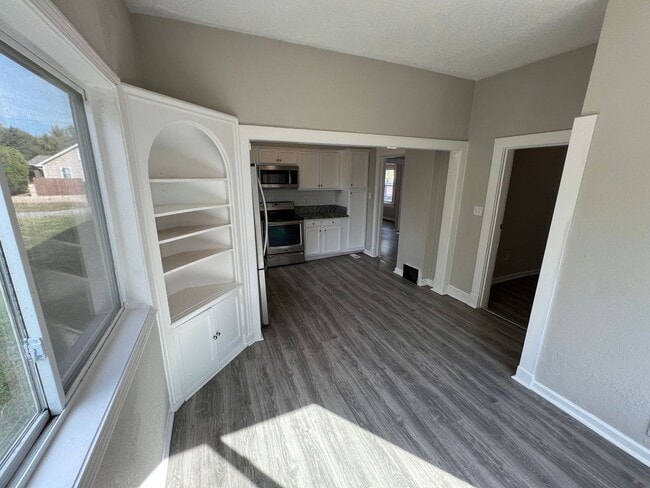 Building Photo - Updated 4-Bedroom Home with Plenty of Living and Storage Space.