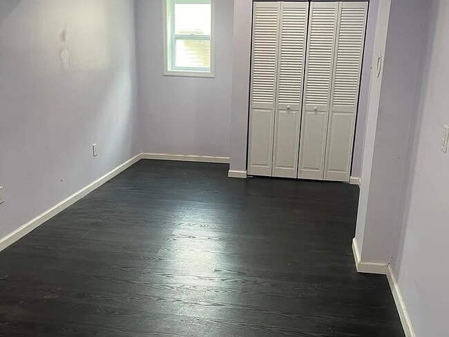 Building Photo - The home features beautiful LVP flooring, granite countertops, stainless steel appliances, and a ...