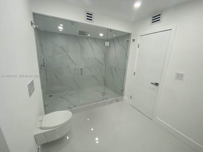 Building Photo - 19390 Collins Ave