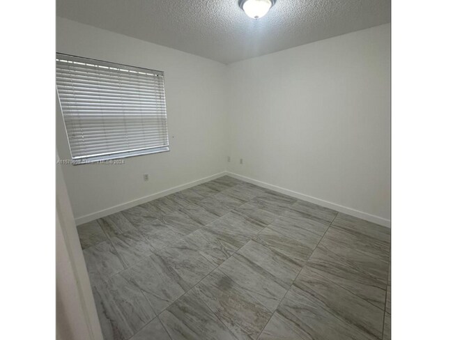 Building Photo - 10833 NW 7th St