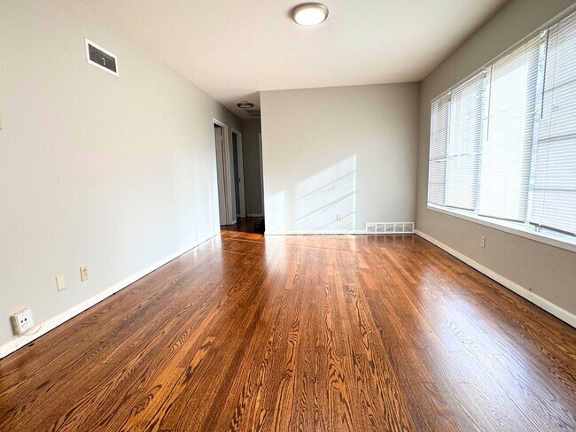 Building Photo - Charming Mid-Century Home with Basement and Fenced Backyard!