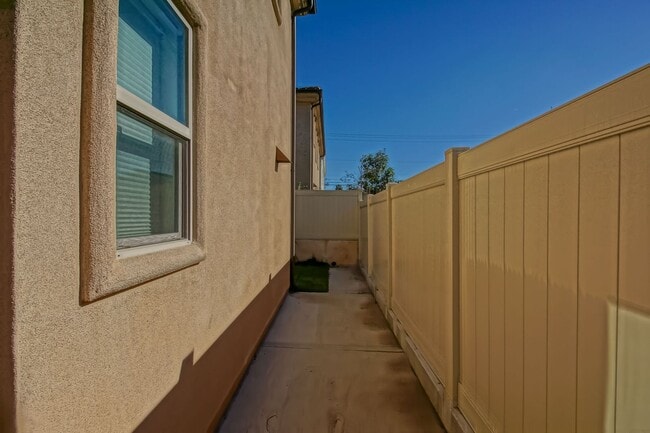 Building Photo - BUILT IN 2019: SPACIOUS & BRIGHT, DETACHED TOWNHOUSE W/ 2-CAR GARAGE & FENCED YARD IN GREAT RESID...
