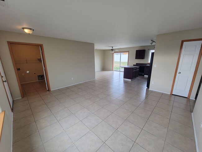 Building Photo - Comfortable 4-Bedroom Home with Fenced Bac...